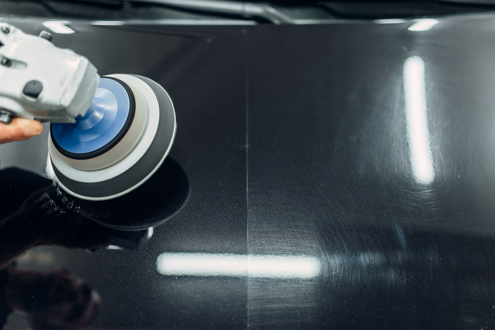 Black car paint correction at Top-Notch Detailing